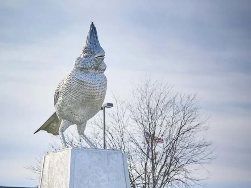 Exterior of Newton High School, a tan brick building.